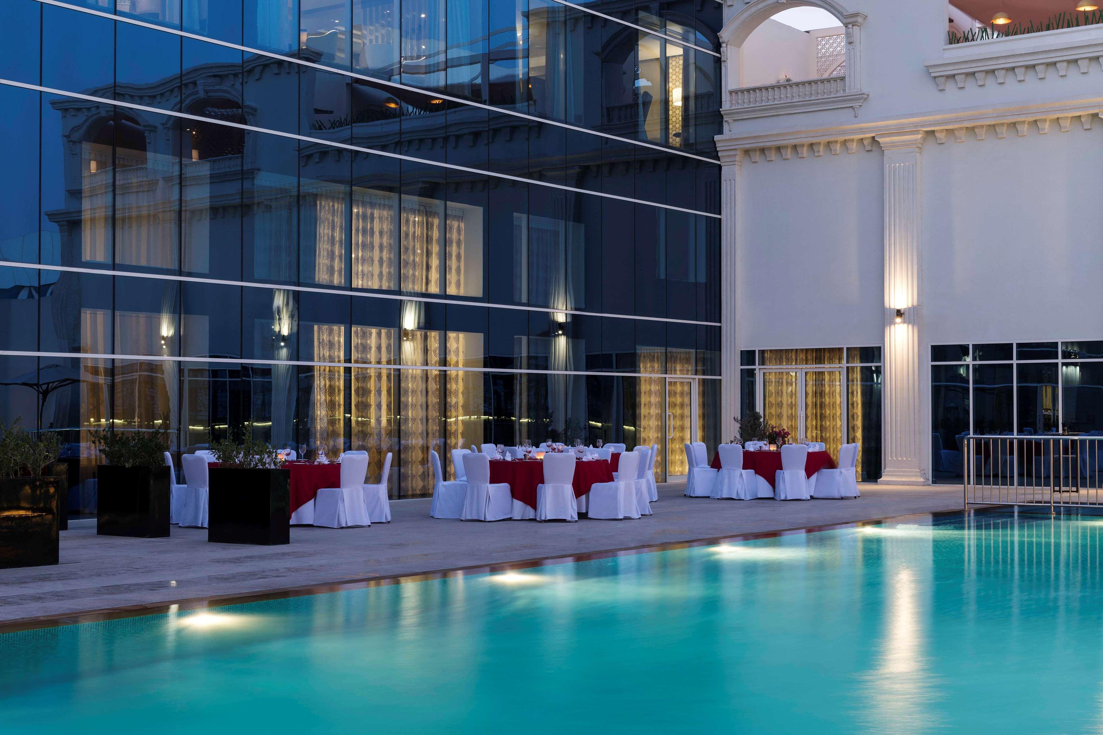 Radisson Blu Hotel, Ajman Exterior foto The pool at the hotel